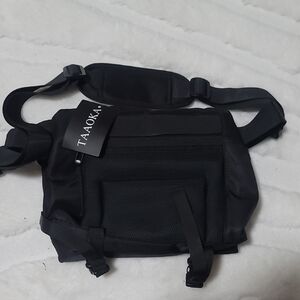 Taaoka Black Camera Bag with Adjustable Straps and Durable Fabric